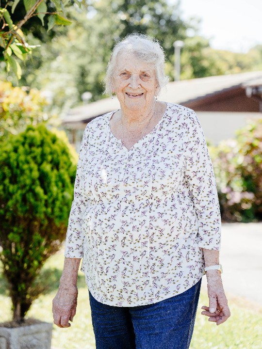 Long-standing British Red Cross volunteer Anne, pictured at home