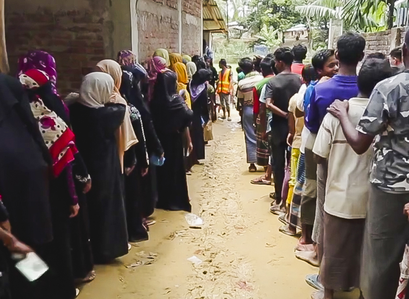 Men and women line up separately at Cox's Bazar, Bangladesh