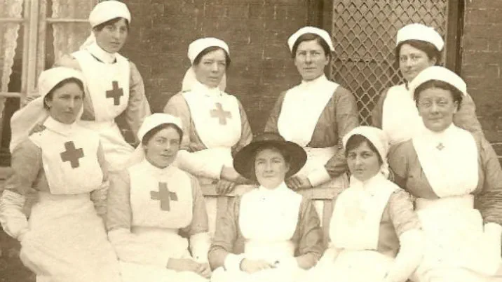 A black and white photograph of a group of Red Cross nurses (VADs), featuring nurse, Peggy Arnold
