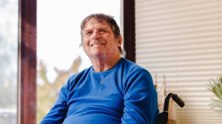 Graham sits in a wheelchair and describes his experience of loneliness and being helped by the British Red Cross.