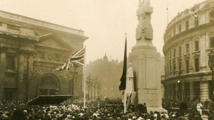 A black and white photograph showing the unveiling of the British Red Cross nurse Edith Cavell's memorial statue in Trafalgar Square, London.