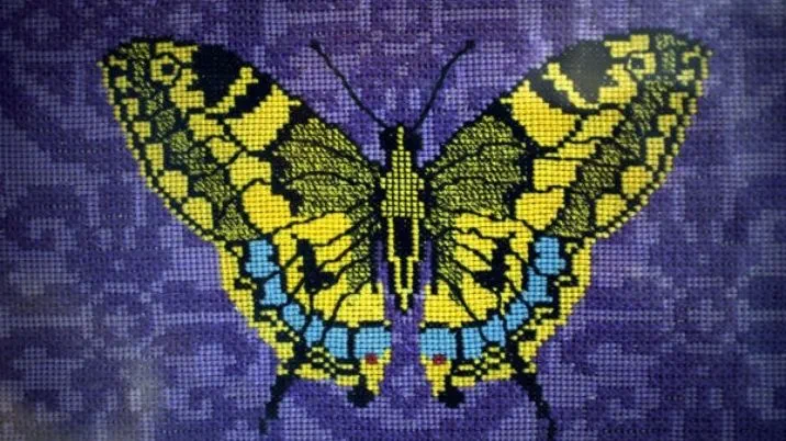An embroidered butterfly by prisoner of second world war, Alexis Casadagli.