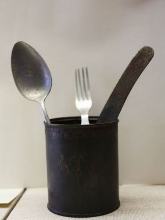 Utensils in a black pot, belonging to prisoner of the second world war, Alexis Casadagli