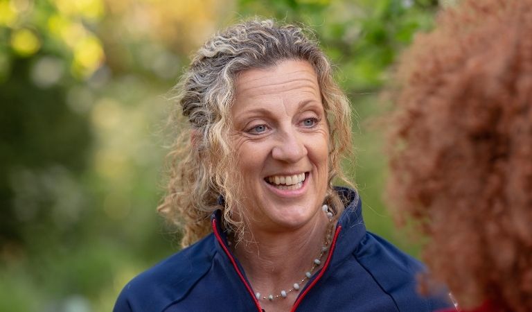 Sally Gunnell plays blind football with the British Red Cross and young refugees.