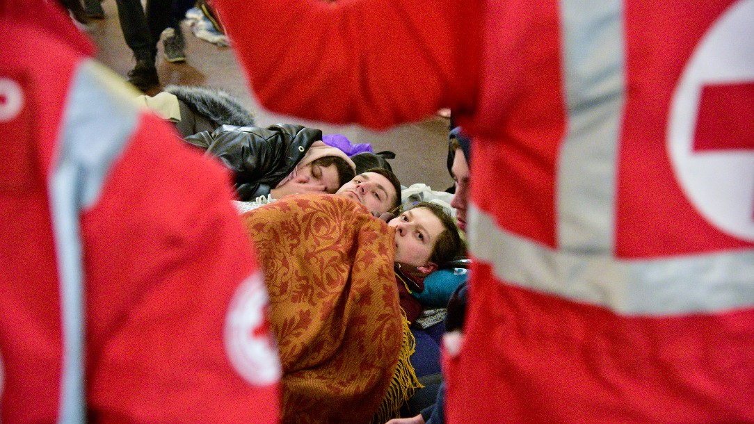 Ukrainian Red Cross staff and volunteers are providing food and other basic necessities to about about 8,000 people who are sheltering in a subway station in Kyiv.