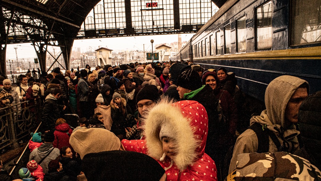 Thousands of civilians from all regions of Ukraine wait at the Lviv train station for an opportunity to leave the country