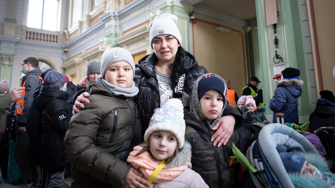 Tanja and her children at the Przemysl train station waiting for transportation to Warsaw