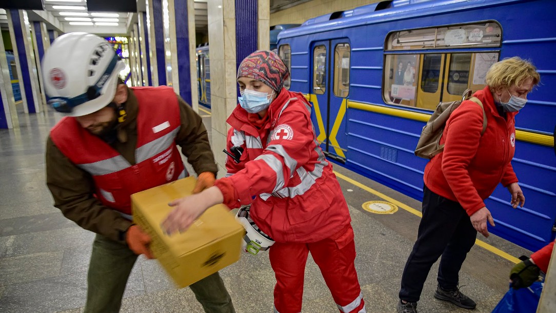 Ukrainian Red Cross staff and volunteers are providing food and other basic necessities to about about 8,000 people who are sheltering in a subway station in Kyiv