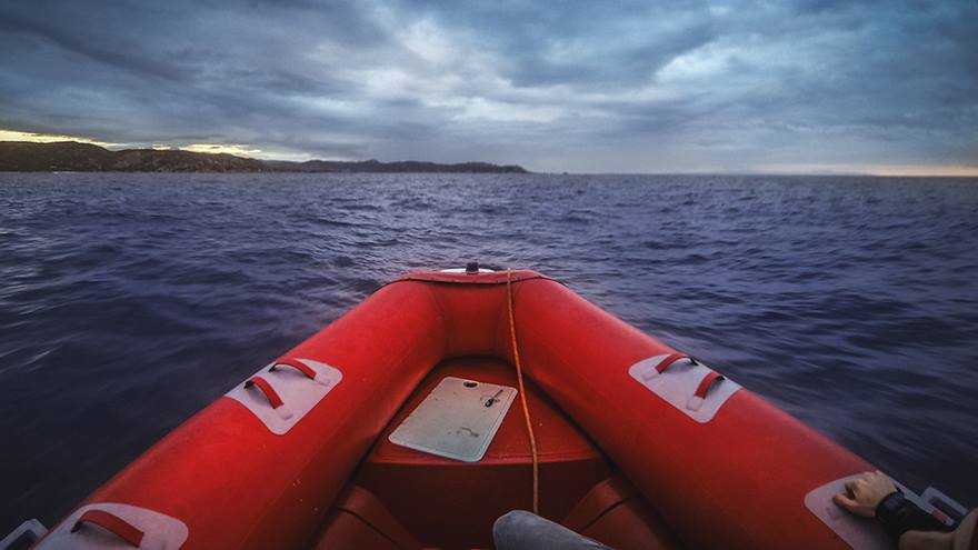 The front part of a boat crossing the channel.