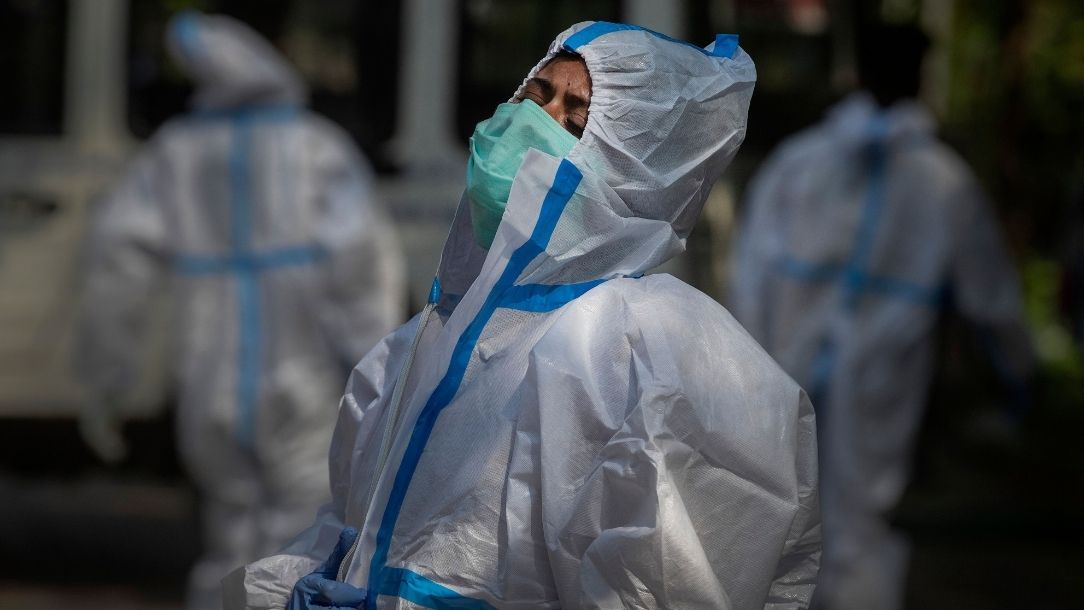 A devastated man in India cries as he loses his fiance to the coronavirus