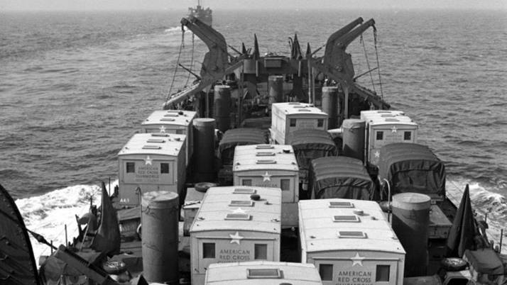 A black and white photograph showing D-day clubmobile service