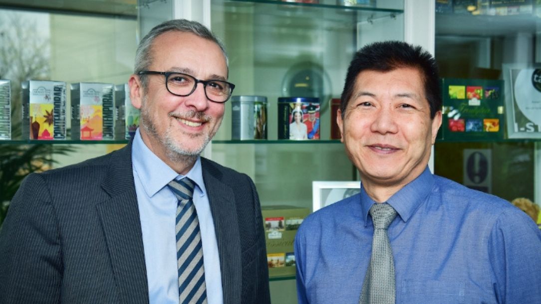 Tim Connor with his colleague, Tony Wong, who he helped through a heart attack.