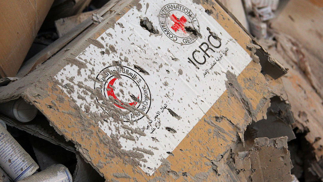 Damaged aid lies inside a warehouse after an attack on Syrian Arab Red Crescent aid convoy in Aleppo.