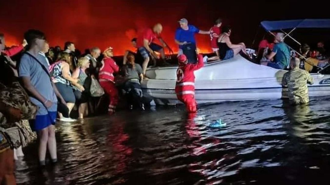 People are evacuated during the Charon heatwave in Greece 2023.