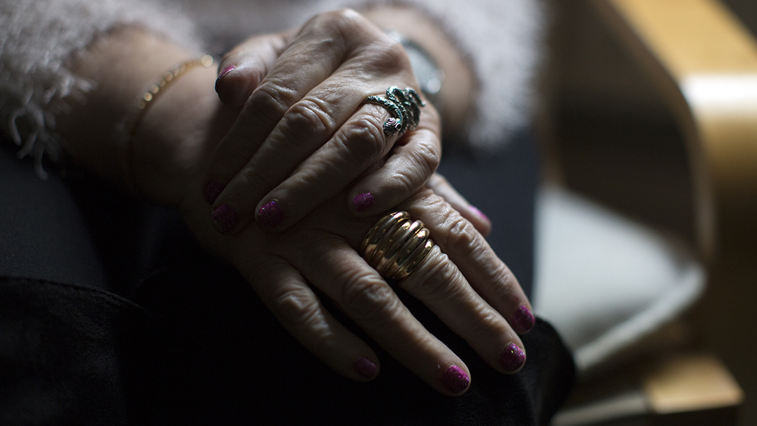 Close up shot of an older lady's hands. 9 million people in the UK are lonely.