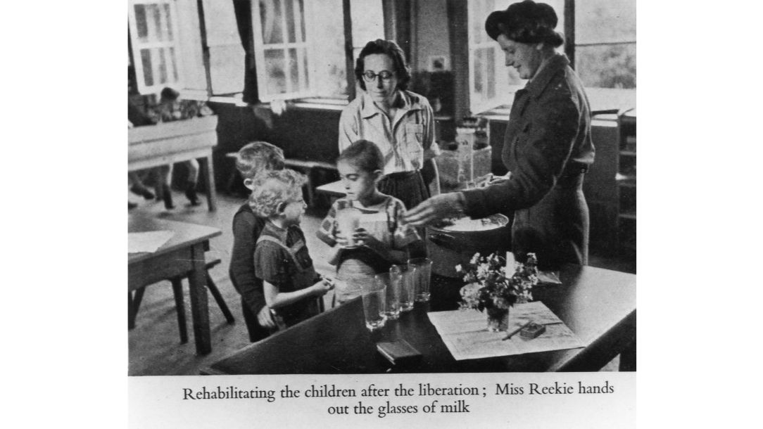 British Red Cross workers giving milk to children in the Bergen-Belsen concentration camp after liberation.