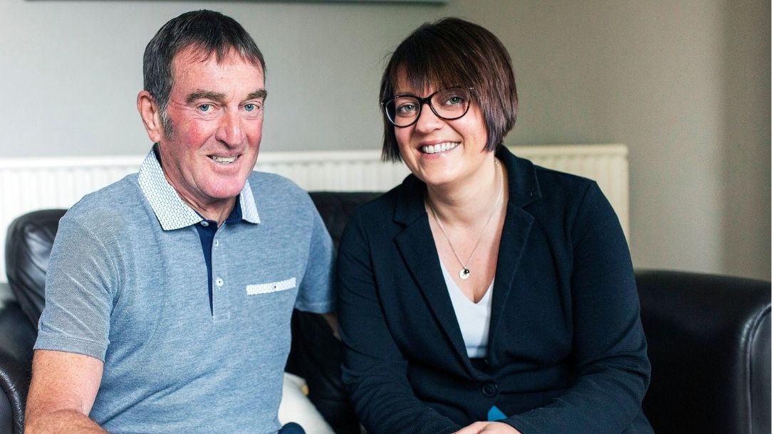 Zoe Tootle sits with her dad, who she saved from a heart attack thanks to British Red Cross advice.