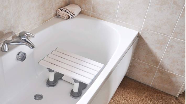 Bath with a bath seat.