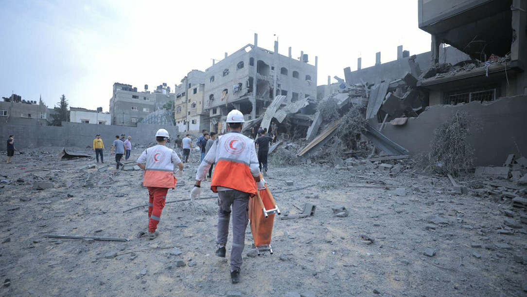 Palestinian Red Crescent staff and volunteers responding in Gaza.