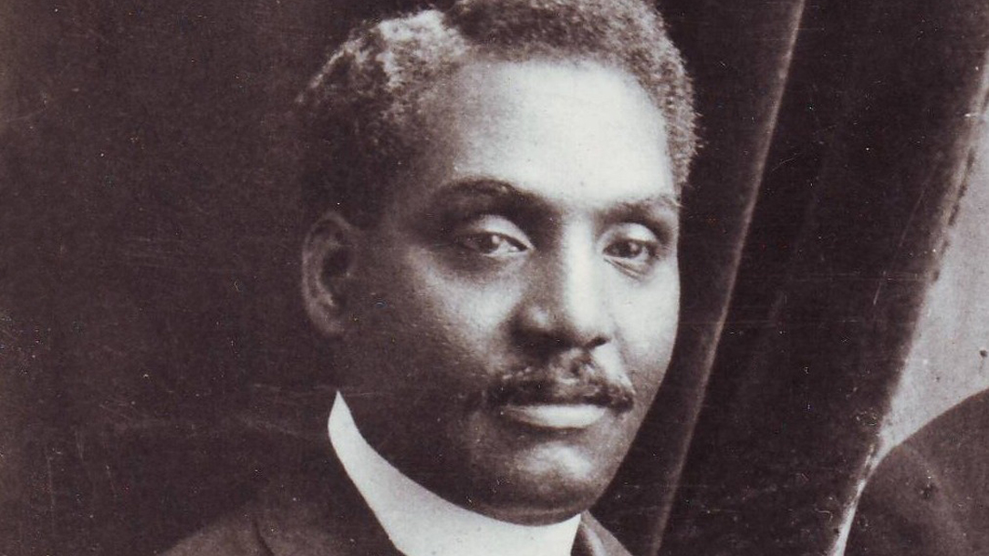 A photograph of Dr John Alcindor.