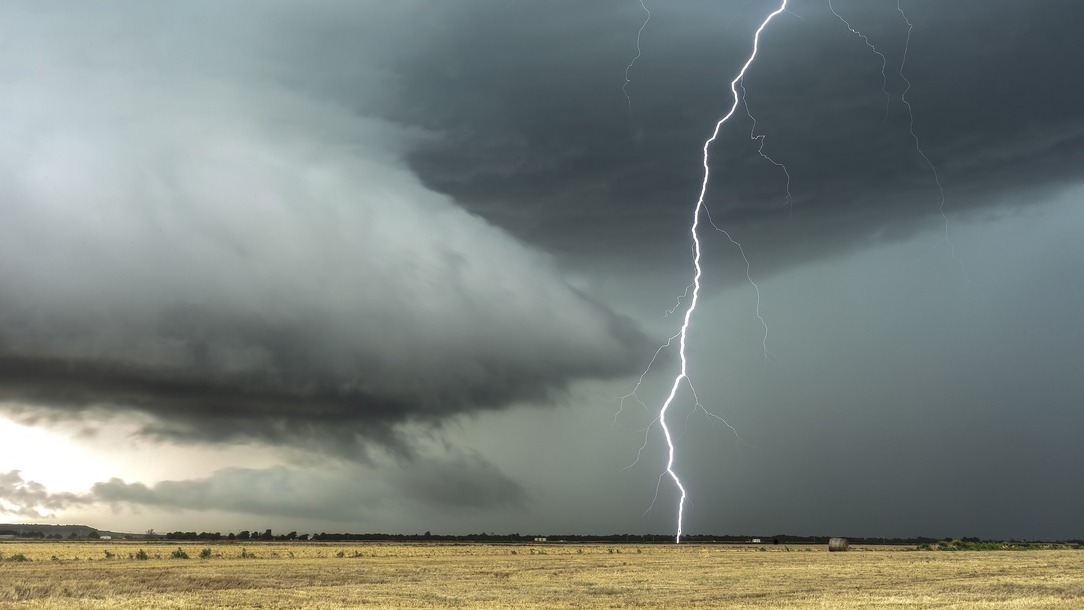 Lightning striking field