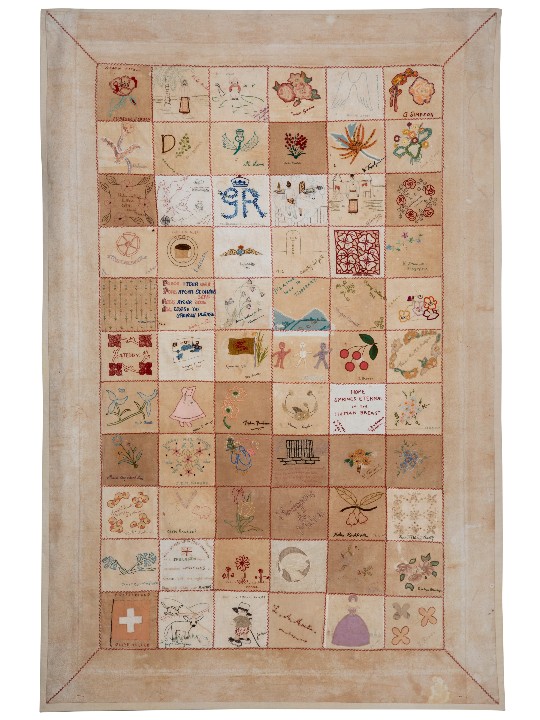 Image of the Changi quilt, a patchwork quilt made by women internees at Changi jail in Singapore in 1942