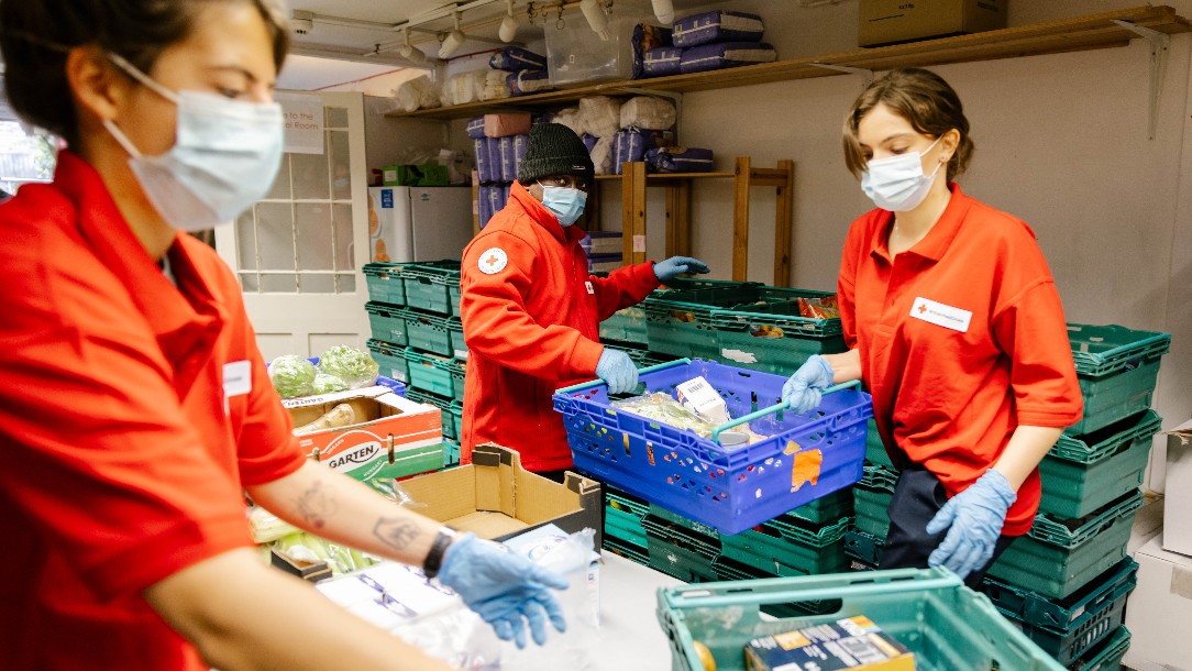 Volunteers at the Hackney resource centre pack food parcels 