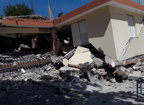 A badly damaged building is seen after the area was struck by a huge earthquake