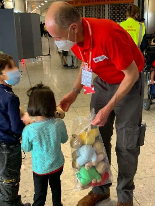 At Heathrow Airport, British Red Cross volunteers have been welcoming Afghan families relocating to the UK. Volunteers Yasmin, Michael and Andy are among the volunteers who have been handing out food, clothing, and toys to arriving families, while also providing emotional support.