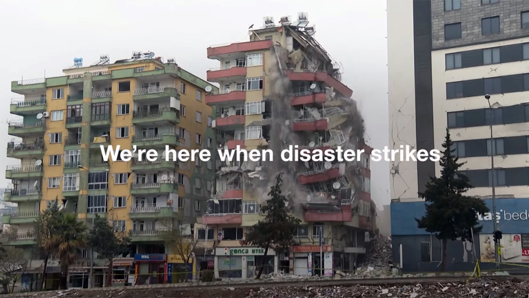 Video still of buildings collapsing in Turkey Syria earthquakes.