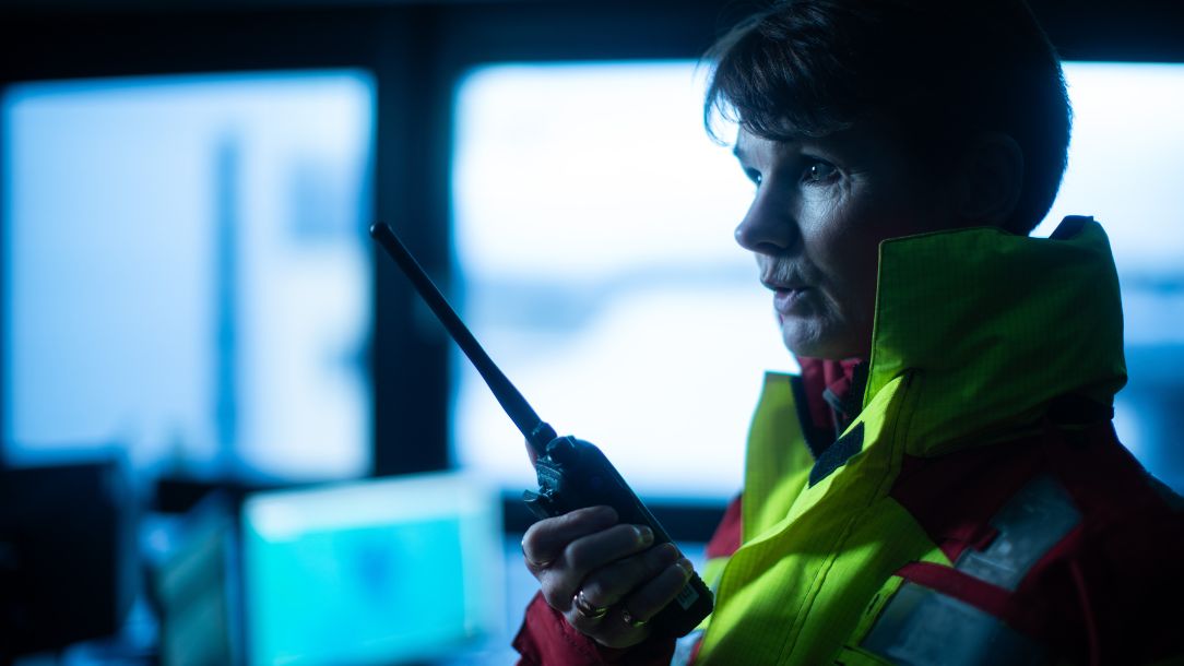 Susan, an Emergency Response volunteer from Aberdeen, co-ordinates operations on her radio during Storm Babet.