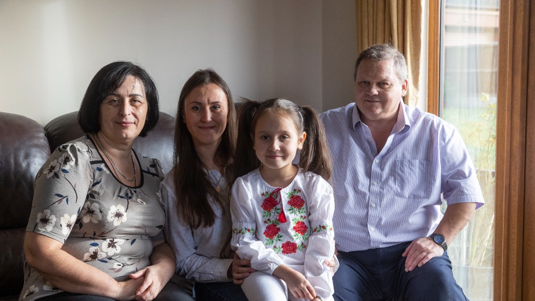 Polina, Karyna, Mylana and Tony smile for the camera 