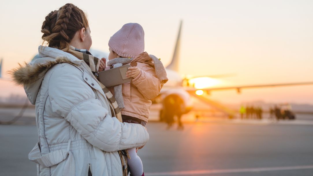 A Ukrainian woman and her child at the airport