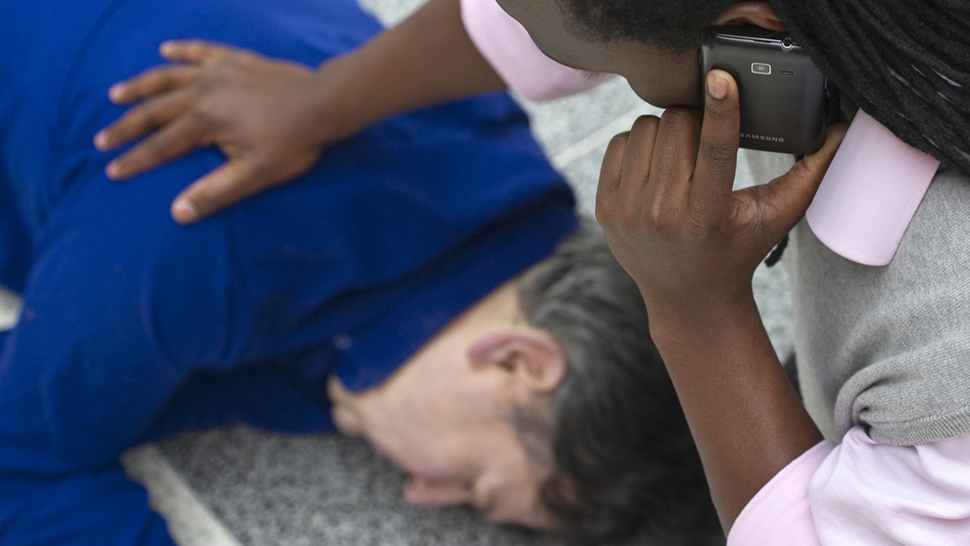 Unconscious man lying on the floor