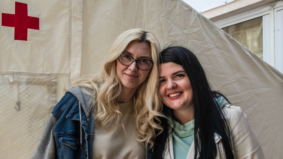 Jana and Anna who have both received cash cards from the Red Cross.