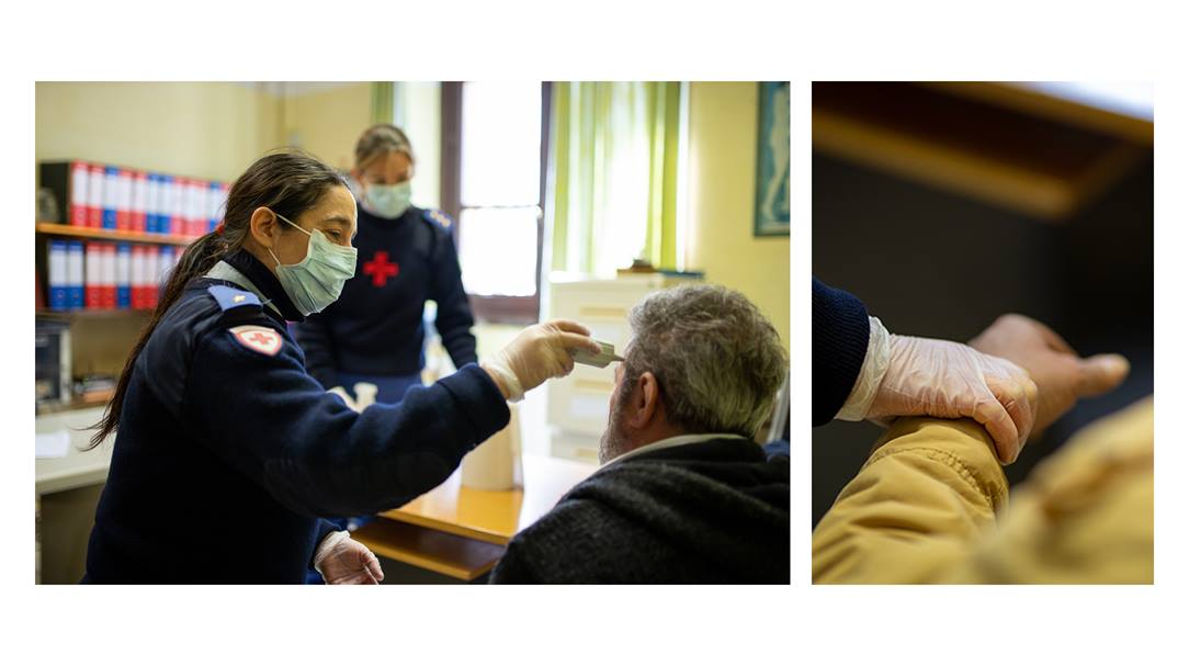 Two pictures: one shows an Italian Red Cross worker wearing a mask taking a man's temperature and the second shows her feeling his wrist pulse with a gloved hand.